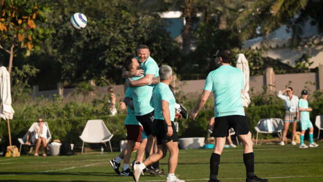 Wayne Rooney celebrating with parent at Parents' Match